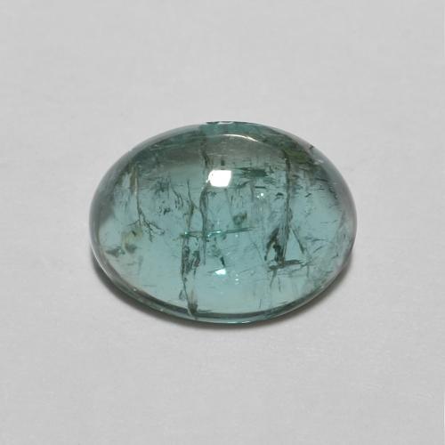 Овал Бирюза Турмалин 8,1 x 6,1 mm из Мозамбик, вес 1,48 ct, натуральный без дополнительной обработки драгоценный камень, чистота: Transparent, 1 кусок Турмалин - цвет: Темно-зеленый синий, твердость по Моосу 7 - 7,5 подходит для повседневного ношения украшений, Символизирует защиту, Photo A