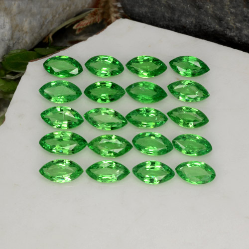 20pc Marquise Green Tsavorite Garnet Lot from Tanzania - Weight 3.47ct total / avg. 0.17ct each, Size 4.7 x 2.7mm, Color: Bright Green, Mohs Hardness 6.5 - 7.5 suitable for daily wear jewelry, Photo A