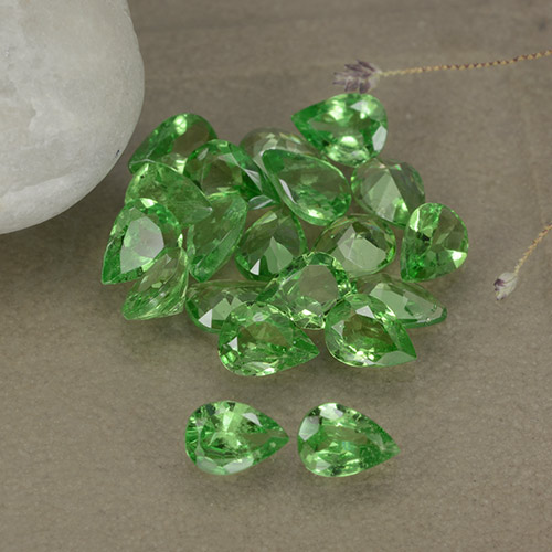 20pc 4 x 3mm Pear Tsavorite Garnet Lot - 2.99ct total Weight / avg. 0.15ct each, Color: Bright Green, Mohs Hardness 6.5 - 7.5 suitable for daily wear jewelry, Photo A