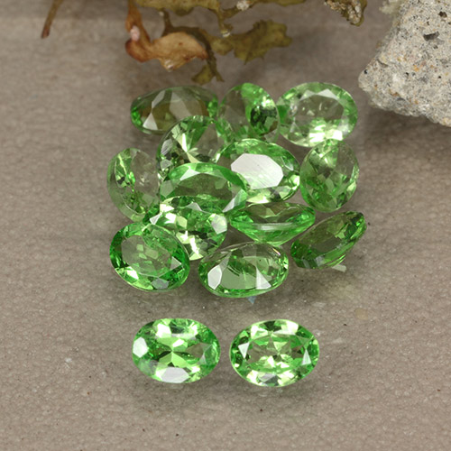 15pc Oval Facet Green Tsavorite Garnet Lot from Tanzania - Weight 2.24ct total / avg. 0.15ct each, Size 3.9 x 2.9mm, Color: Lively Green, Mohs Hardness 6.5 - 7.5 suitable for daily wear jewelry, Photo A