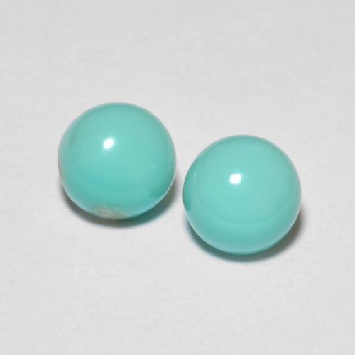 2pc Matching Round Turquoises in Size 5.1mm, Weight 1.31ct total / avg. 0.66ct each, Blue Green in Opaque Clarity, Natural untreated gemstone, Mohs Hardness 5 - 6, Photo A