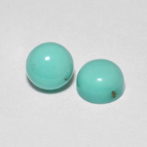 Matching Pair of 5.1mm Round Cabochon Turquoise, Weight of 1.28ct total / avg. 0.64ct each, Matching Turquoise Pair in Opaque Clarity in Blue Green Color, Natural untreated gemstone, Mohs Hardness 5 - 6, Photo A