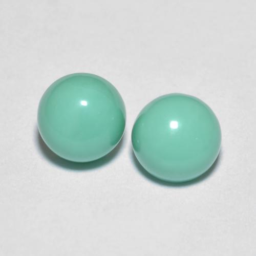 2pc Matching Round Turquoises in Size 5.1mm, Weight 1.24ct total / avg. 0.62ct each, Bright Teal in Opaque Clarity, Natural untreated Gemstone, Mohs Hardness 5 - 6, Photo A