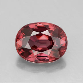 Pinkish Red Zircon Gem - 3.3ct Oval Facet (ID: 318480)
