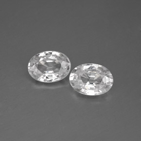 7 x 5,2mm Paar ovaler Zirkon - Gewicht 2,45 ct gesamt / durchschn. 1,23 ct, Weiß Farbe in VVS Reinheit, natürlicher Edelstein, Mohs-Härte 6,5 - 7,5 Geeignet für den täglichen Gebrauch im Schmuck, Dezember Geburtsstein, Photo A