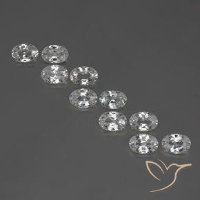 Lotto di 10 pezzi Zircone bianco taglio ovale dalla Cambogia - dimensioni 6,1 x 4,2mm, peso totale 7,1 ct / media. 0,71 ct ciascuno, colore: Bianco, durezza Mohs 6,5 - 7,5 adatto per gioielli da indossare ogni giorno, Mostra grande brillantezza, Photo A