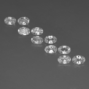 Lot de 10pcs Zircons Ovale de 6,1 x 4,1mm - Poids total de 6,89 ct / poids moyen de 0,69 ct chacune, couleur : Blanc, dureté de Mohs 6.5 à 7.5 convient aux bijoux de tous les jours, pierre de sagesse, Expose Feu Exceptionnel, Photo A