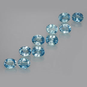 Set aus 10 Stück ovaler Zirkon in blauer Farbe aus Kambidscha - Größe 5,2 x 4,1mm, Gewicht 4,98 ct gesamt / Durchschn. je 0,5 ct, Farbe: Tiefes Azurblau, Mohs-Härte 6,5 - 7,5 Geeignet für den täglichen Gebrauch im Schmuck, Symbolisiert Ehre und Weisheit, Photo A