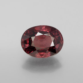 Merlot Red Zircon Gem - 3.1ct Oval Facet (ID: 379669)