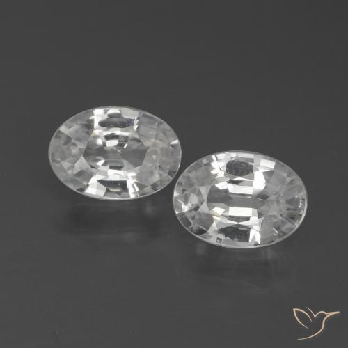 Paire Zircon Ovale 7 x 5mm assorties - Poids total 2,06 ct / moyenne 1,03 ct chacune, couleur Blanc et pureté VS, pierre gemme naturelle , dureté de Mohs 6.5 à 7.5 convient aux bijoux de tous les jours, pierre de sagesse, Pierre de naissance de décembre, Photo A