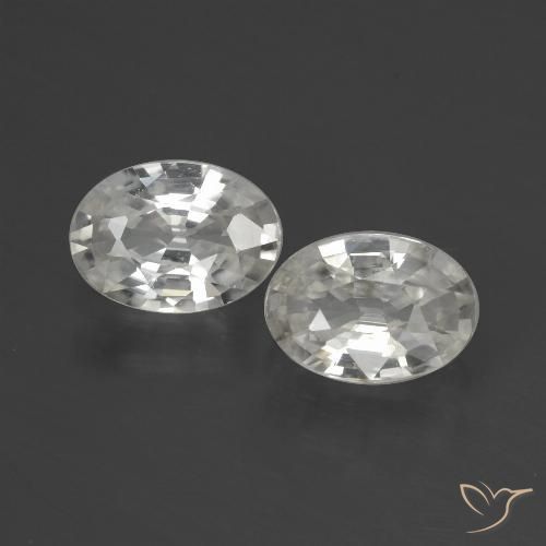 2 pièces assorties Zircon Blanc Ovale de taille 7,1 x 5,2mm, poids total de 2,24 ct / moyenne de 1,12 ct chacune, Blanc avec pureté VS, pierre gemme naturelle , dureté de Mohs 6.5 à 7.5 convient aux bijoux de tous les jours, pierre de sagesse, Symbolise l'honneur et la sagesse, Photo A