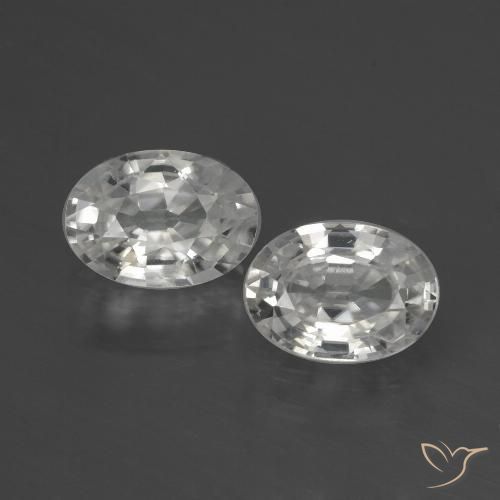 Par de Circón Ovalada a juego de 7,1 x 5,1mm - Peso 2,49 ct en total / promedio. 1,25 ct cada uno, color Blanco en claridad VS, piedra preciosa natural , dureza de Mohs 6.5 - 7.5 Adecuado para joyas de uso diario, Piedra natal de diciembre, Photo A