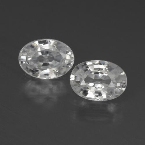 7,1 x 5,1mm Oval Zirkon-Paar - Gewicht 2,56 ct gesamt / durchschnittl. 1,28 ct, Garantiert natürliche Edelsteine, Weiß Farbe in VVS-VS Reinheit, Mohs-Härte 6,5 - 7,5 Geeignet für den täglichen Gebrauch im Schmuck, Dezember Geburtsstein, Photo A