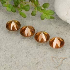 Zircon Gemstones in 6 mm (calibrated) Size for Sale, Zircon Stones in Medium-Dark Orange Color