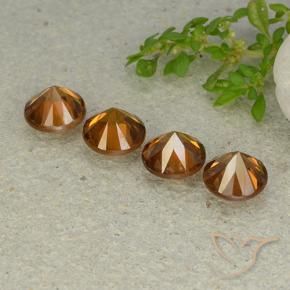 Zircon Gemstones in 6 mm (calibrated) Size for Sale, Zircon Stones in Medium-Dark Orange Color