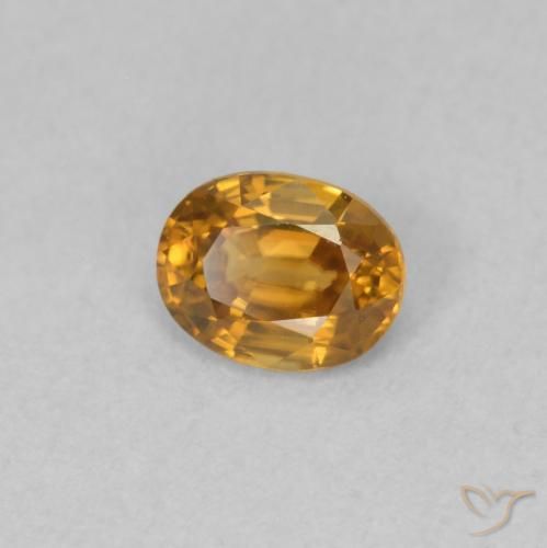 0.59 ct Orange Zircon Stone, Natural Zircon in Oval Facet Shape for Sale