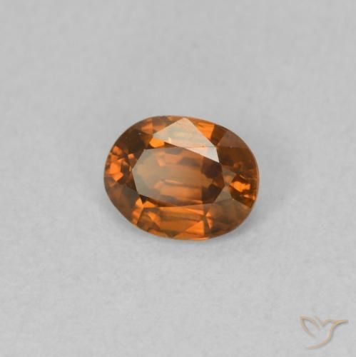 0.59 ct Orange Zircon Stone, Natural Zircon in Oval Facet Shape for Sale