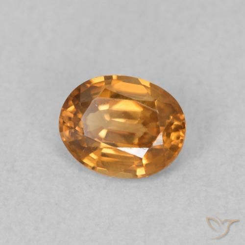 0.61 ct Orange Zircon Stone, Natural Zircon in Oval Facet Shape for Sale
