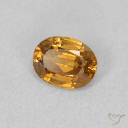 0.61 ct Golden Zircon Stone, Natural Zircon in Oval Facet Shape for Sale