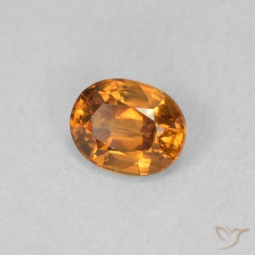 0.65 ct Orange Zircon Stone, Natural Zircon in Oval Facet Shape for Sale