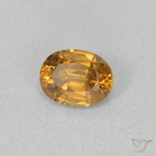 0.58 ct Orange Zircon Stone, Natural Zircon in Oval Facet Shape for Sale