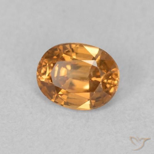 0.65 ct Orange Zircon Stone, Natural Zircon in Oval Facet Shape for Sale