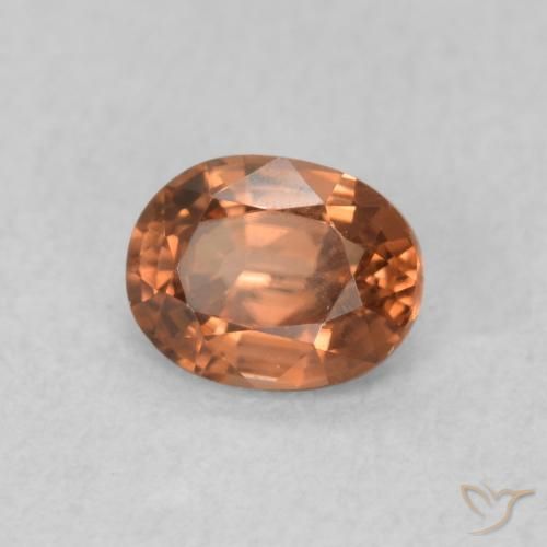 0.59 ct Orange Zircon Stone, Natural Zircon in Oval Facet Shape for Sale