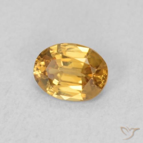 0.57 ct Golden Zircon Stone, Natural Zircon in Oval Facet Shape for Sale
