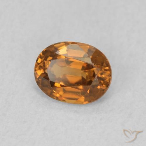 0.59 ct Orange Zircon Stone, Natural Zircon in Oval Facet Shape for Sale