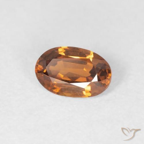 0.67 ct Orange Zircon Stone, Natural Zircon in Oval Facet Shape for Sale