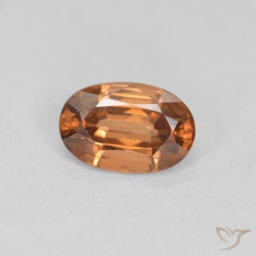 0.69 ct Orange Zircon Stone, Natural Zircon in Oval Facet Shape for Sale