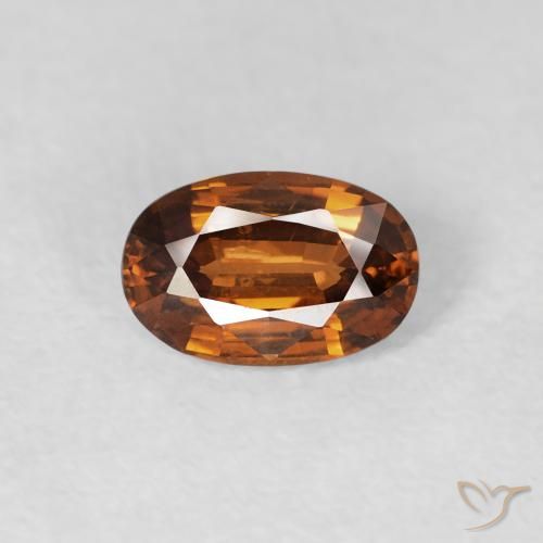 0.73ct Natural Medium Dark-Orange Zircon, Oval, VVS-VS
