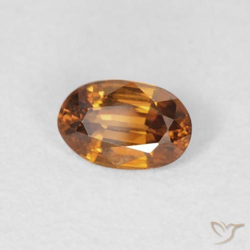 0.69 ct Orange Zircon Stone, Natural Zircon in Oval Facet Shape for Sale