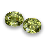 thumb image of 0.5ct Oval Facet Warm Green Demantoid Garnet (ID: 458151)
