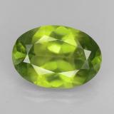 thumb image of 6.1ct Oval Facet Lively Green Idocrase (ID: 503095)