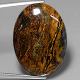 thumb image of 27.9ct Oval Cabochon Multicolor Pietersite (ID: 447857)